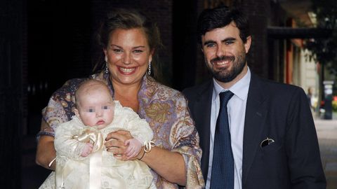 Caritina y Antonio Matos durante el bautizo de su primer hijo en 2010.