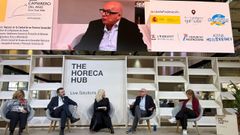 El diputado Xos� Regueira, durante una mesa redonda en el encuentro que se celebra en Barcelona