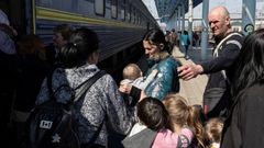 Ucranianos huyendo del pa�s