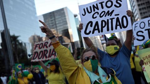 El �bolsonarismo� ha desafiado las cuarentenas e ido a las calles a reclamar la �vuelta al trabajo� en protestas que han pedido hasta el �cierre� del Supremo y el Parlamento
