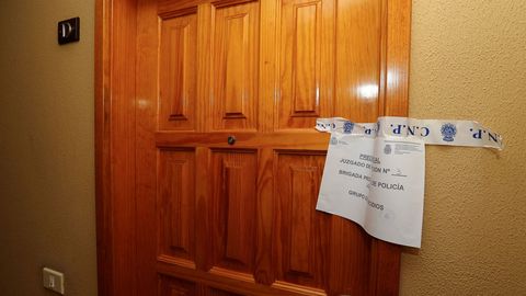 Puerta de la vivienda en la que se produjo el crimen