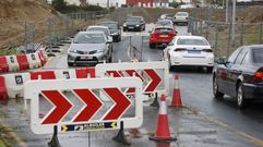 Veh�culos circulando ayer al mediod�a por el baip�s que funciona en la Trinchera desde septiembre.