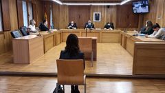 La matrona lucense acusada de descubrimiento y revelaci�n de secretos sali� absuelta.