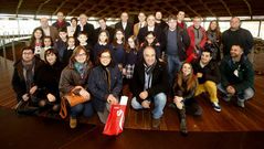 Autoridades, ganadores y familiares, ayer en Dombate.