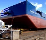 La primera barcaza de Galictio fabricada y bautizada en Uruguay