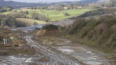 Obras de la autov�a A-54 en el enlace de Arz�a Sur, con le terreno encharcado y sin capas de rodadura echadas