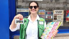 Mar�a Isabel Turnes, con uno de los cupones diarios que la ONCE dedic� al eclipse del 12 de agosto
