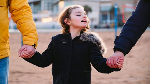 Nora Montoto, en la playa, con sus padres