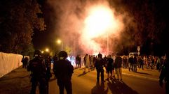 La polic�a protegi� de los ataques xen�fobos a 250 inmigrantes hasta un centro de acogida de Heidenau.