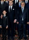Mohamed VI, con su hijo y el primer ministro Benkir�n.