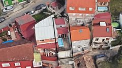 La vivienda ilegal con piscina, marcada con un recuadro negro, en una imagen area de Google Earth.