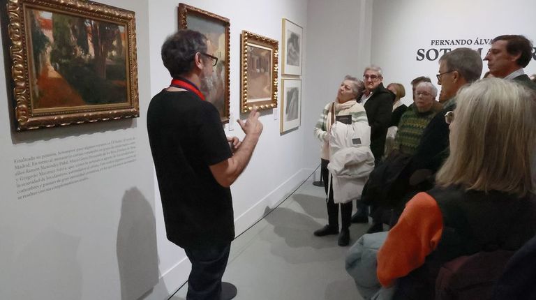 Visita de suscriptores de La Voz a la exposici&oacute;n, en diciembre 