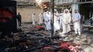 Autoridades de Kuwait inspeccionan la terminal del aeropuerto calcinada por el ataque iran�