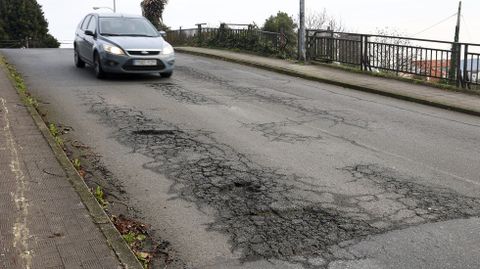 Baches en el puente de la calle Manuel Belando, en la zona de Caballo Blanco.