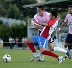 Un lance del partido disputado en el campo de O Roxo.