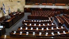 El presidente Reuven Rivlin, en la sesi�n del Parlamento semivac�o este jueves