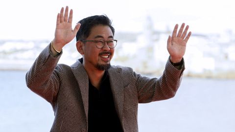 El director de &laquo;Hope&raquo;, el coreano Na Hong-jin, posa para los medios