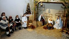 Un bel�n viviente en la celebraci�n de la misa de Navidad  en  la iglesia parroquial de Celeiro