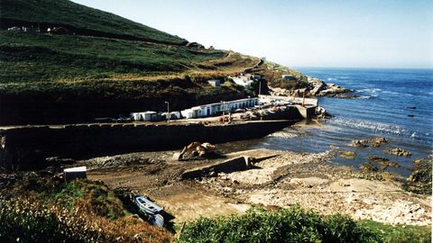 La avalancha de basura se llev por delante vehculos, casetas de pescadores, el galpn del Club Martimo y una casa que en aquel momento no estaba habitada