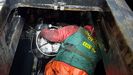 Primer agente en acceder al narcosubmarino del 2019 tras su reflotaci�n en el puerto de Ald�n.