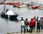 El vigilante de la cofrad�a fue v�ctima el mi�rcoles de un ataque en el muelle.