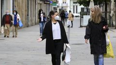 Gente con mascarillas en la r�a da Ra��a