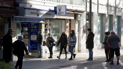 Colas para comprar loter�a de Navidad en el Fil�n de Oro, en la r�a Nova de A Coru�a