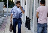 El exagente de banca en Laxe, este mi�rcoles al llegar al juzgado carball�s. 