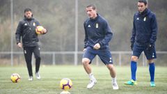 Christian Fern�ndez, con Folch detr�s, en un entrenamiento