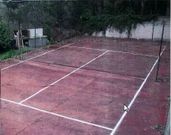 Imagen de la pista de tenis derribada en el mes de julio. 