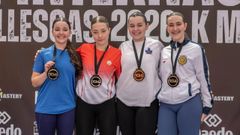 Penabad, a la izquierda, con su medalla en Illescas.