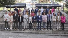 Foto de familia de la candidatura del PP de Ferrol, esta ma�ana en Amboage. 