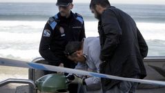 La polic�a, en el paseo mar�timo buscando el bot�n