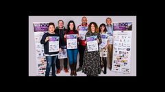 Bel�n G�mez, en el centro, con los colaboradores que le ayudan en la organizaci�n de la Carrera de las Ciudades