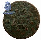 Reverso de la moneda, con la supuesta figura de un escudo castre�o.