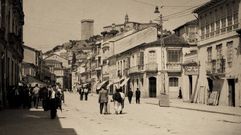 La vivienda, a la derecha, cuando en la planta baja estaba el Palacio del Mueble