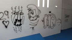 Pintadas y desperfectos en�un local de la empresa Parkour
