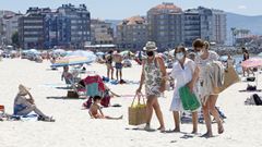 Ba�istas disfrutando del buen tiempo en Sanxenxo