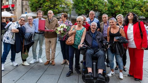 Portu, en silla de ruedas, en una comida homenaje a Lino Castro