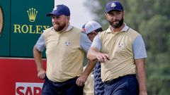 Jon Rahm, en Bethpage junto a su compaero Shane Lowry.