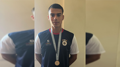 Borja N���z, con la medalla conquistada en el Mundial de remo.