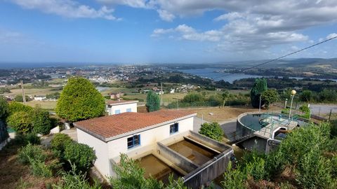 La estacin depuradora de agua y el depsito de Santa Cruz, con el casco urbano de Ribadeo al fondo