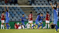 Jugadores del Getafe celebran un gol al Celta en su campo