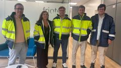 Representantes de la Asociaci�n de Empresarios de As G�ndaras, en las instalaciones de Friotea.