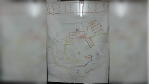 «O primeiro plano da nosa casa, pintado na porta do balcón da cociña do noso piso»