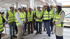 El conselleiro de Educaci�n Rom�n Rodr�guez, visit� las obras del futuro colegio Gerardo Fern�ndez Albor de O Milladoiro acompa�ado del alcalde de Ames, Blas Garc�a, y de representantes municipales de gobierno y oposici�n