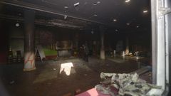 Parte del interior del centro quedó calcinado tras el incendio provocado por un cóctel molotov