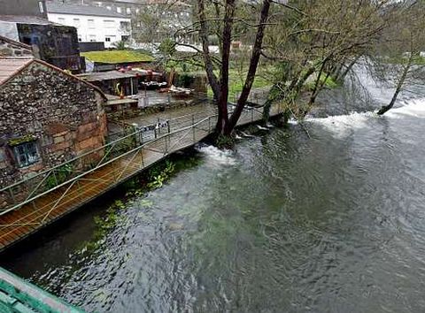 El paso del �Qmaira� volvi� a dejar la tradicional estampa del Umia a punto de desbordarse.