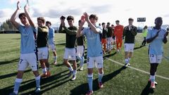 Los futbolistas del Celta Juvenil A, celebrando el triunfo ante el Villarreal en A Madroa.