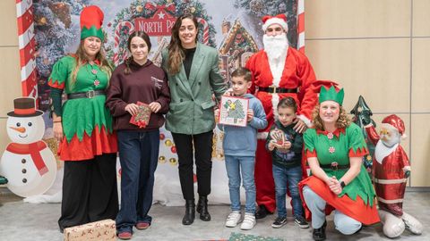 Elina Sanl�s, Fabio Fern�ndez y Sa�l Bri�n ganaron el concurso de postales navide�as de Congalsa.